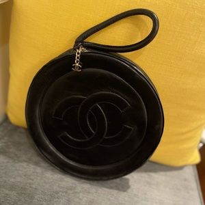 Chanel round black leather bag with wristlet